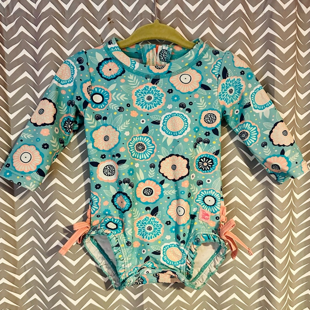 Ruffle Butts | Long Sleeve One Piece Rash Guard. Size 3-6m